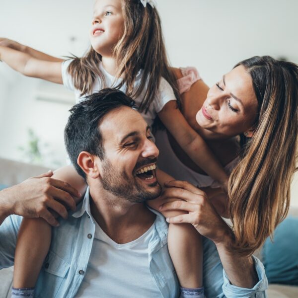 Happy family having fun time at home Happy family having fun time together at home